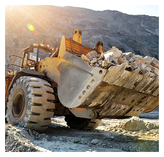 Wheel Loader Machine Unloading Rocks Wheel Loader Machine Unloading Rocks